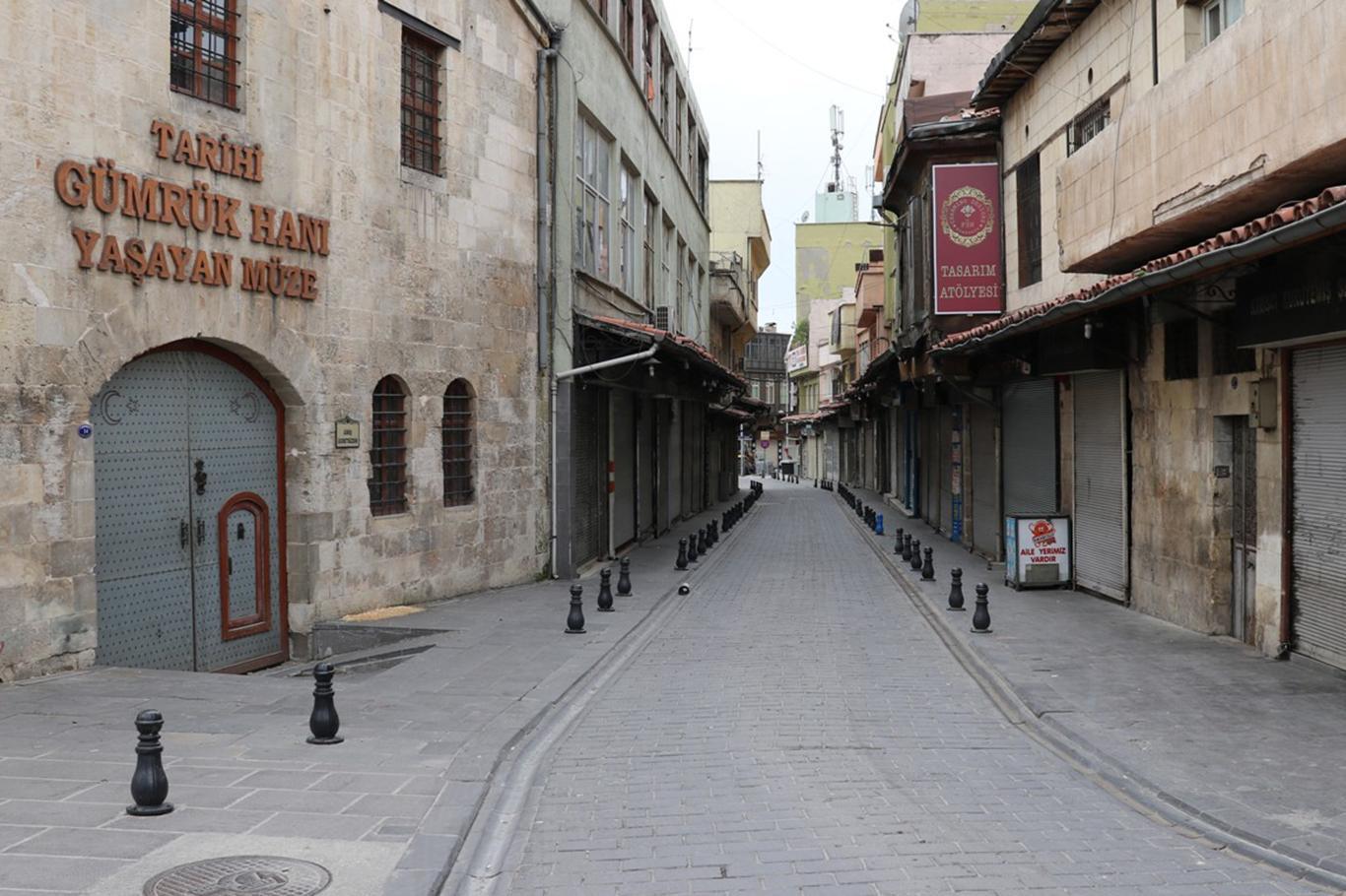 Turkey’s cities fall silent as a two-day curfew begins